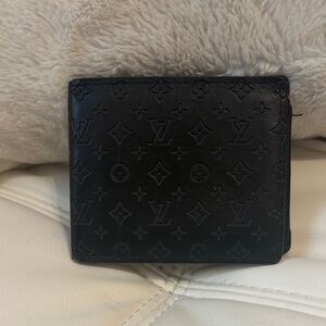 LV Black Monogram Embossed trifold mens Leather Wallet. Preloved
